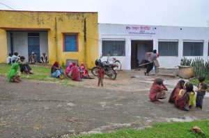 Image of patients waiting to seek consultation outside AMRIT Clinic, Manpur